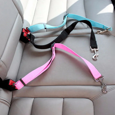 Adjustable Premium Pet Safety Car Belt with Safety Lock in bright colors on car seat.