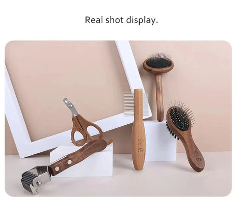 Sustainable pet grooming set with wooden comb and stainless steel nail clippers.