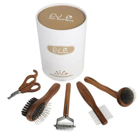 Sustainable pet grooming set with wooden comb and stainless steel nail clipper.