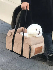 Nonslip Pet Travel Booster Seat for small dogs and cats in beige with carrying straps.