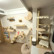 Wall mounted wooden cat climbing shelves with hammock, scratching ladder, and multi-tiered tree tower for large cats