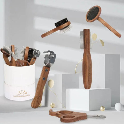 Sustainable Pet Grooming Set with wooden combs and stainless steel nail clippers.